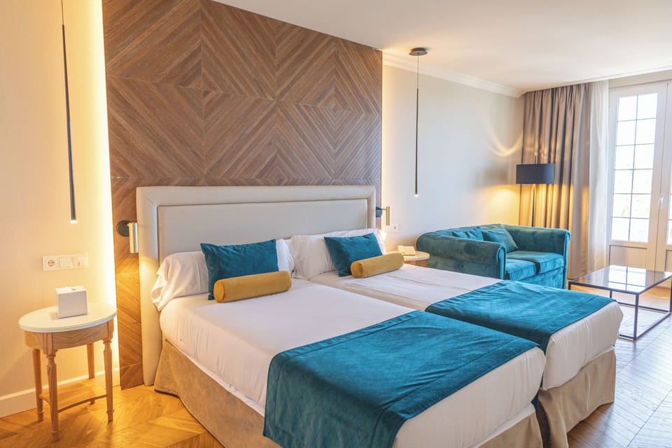 Junior Suite, Harbor View | Minibar, in-room safe, desk, soundproofing