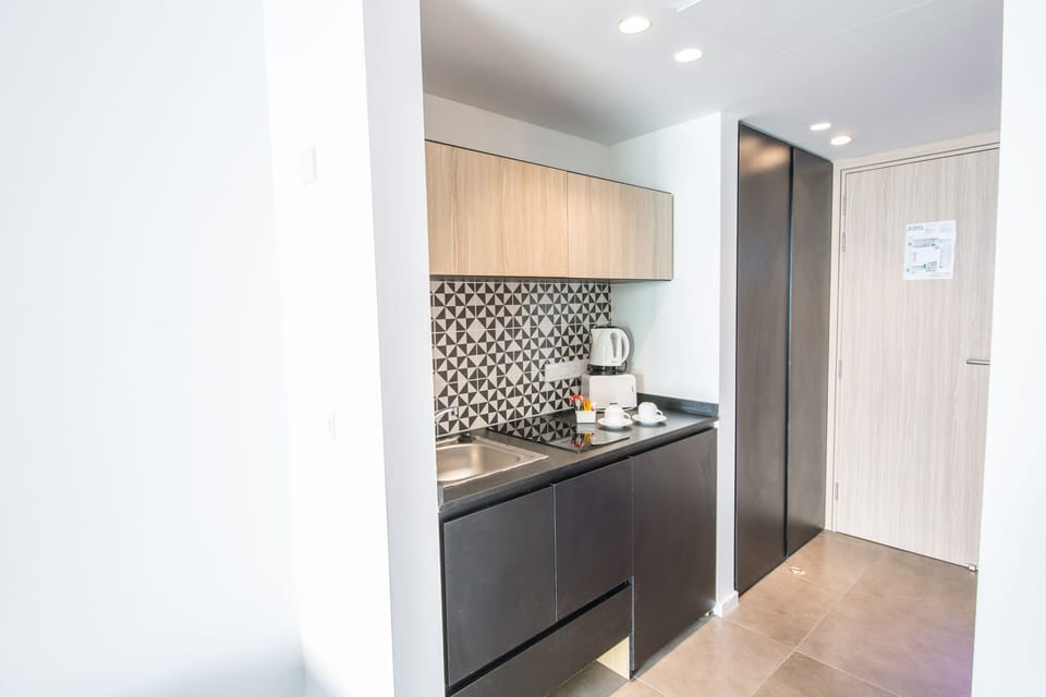 Superior Studio | Private kitchenette | Fridge, stovetop, electric kettle, cookware/dishes/utensils