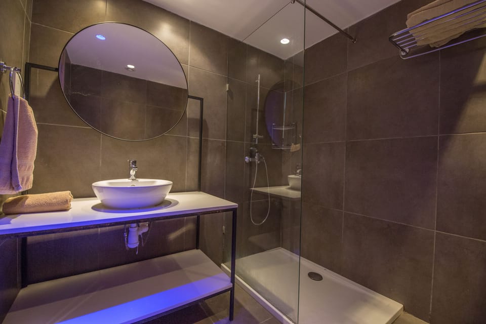 Superior Studio | Bathroom | Deep soaking tub, hair dryer (on request), towels