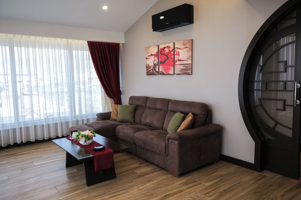 Exclusive Duplex | Living area | 22-inch LCD TV with satellite channels, TV
