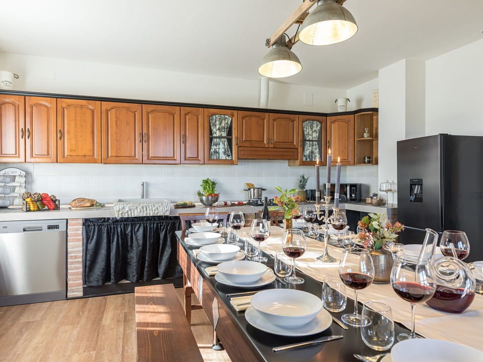 Countertop, Property, Cabinetry, Furniture, Table, Kitchen, Lighting, Dishware, Wood, Interior Design