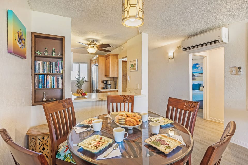 Tropical charm meets modern elegance in this inviting dining space