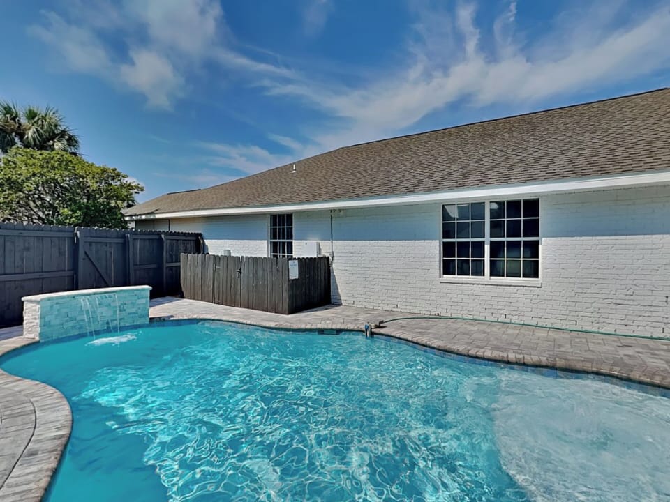 Backyard - Private Pool with Waterfall and Sun Shelf (can be heated for a fee)