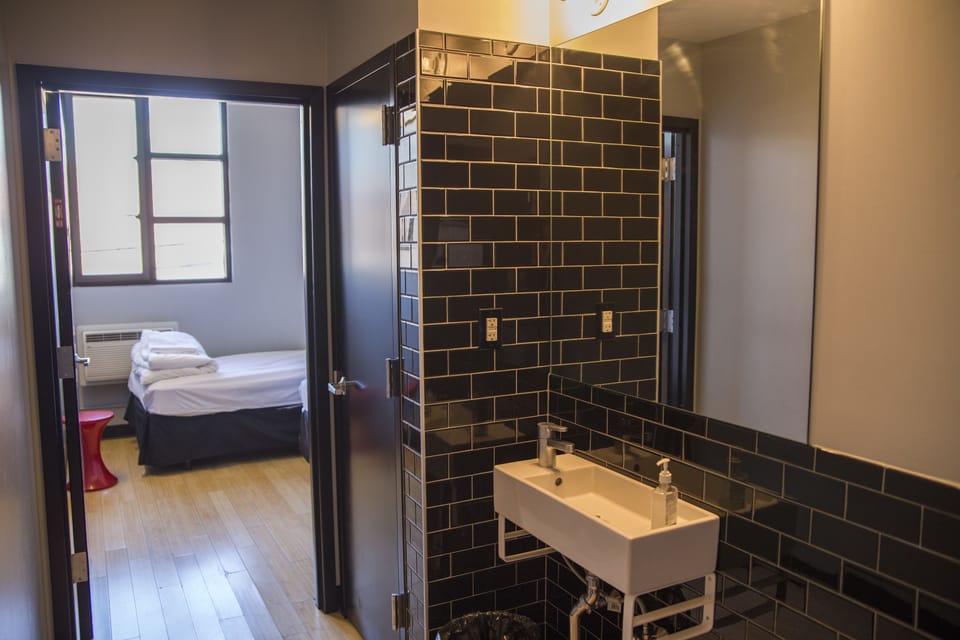 Private Queen Room with Ensuite Bathroom (1 bed) | Bathroom | Shower, hair dryer (on request), towels