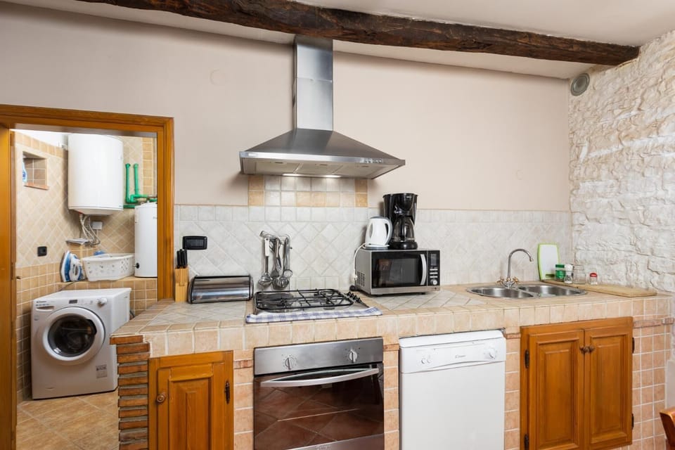 Equipped kitchen on ground floor