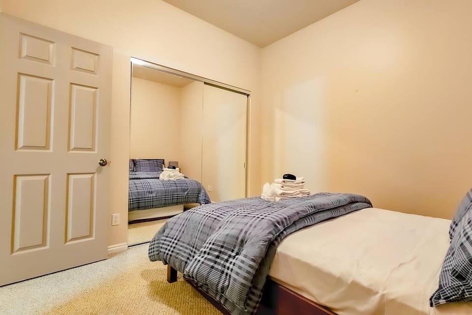 There is a large closet for storage in the third bedroom.