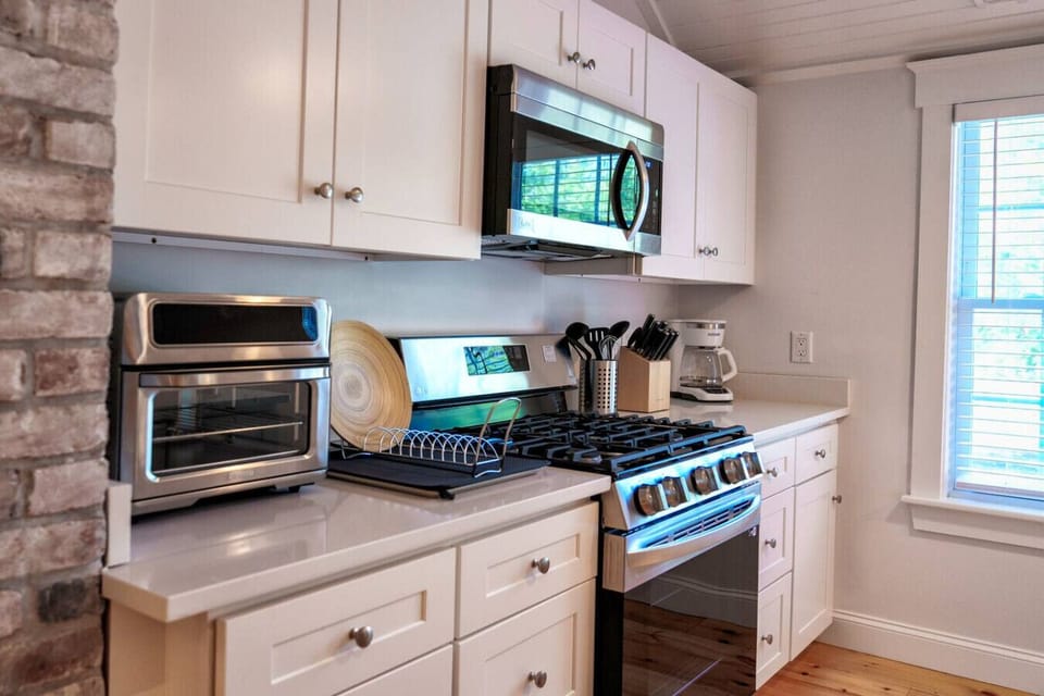 Stainless Steel Appliances: Gas stove and Oven, Microwave, & Toaster Oven