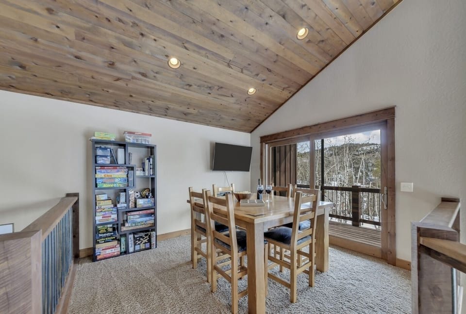 Loft game area with a private patio - again, large doors to take in that view! 