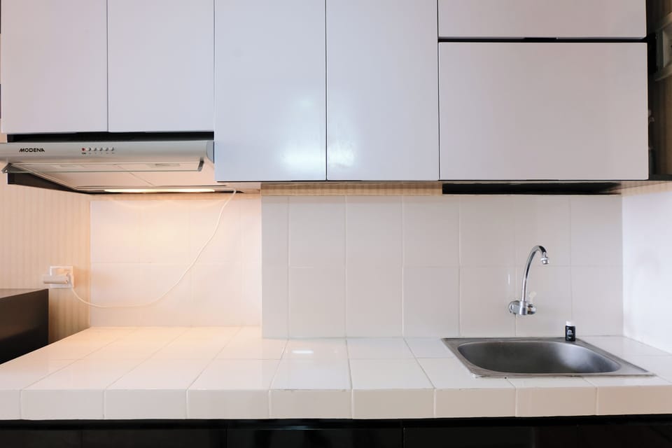 Deluxe Apartment | Private kitchen | Full-size fridge, stovetop, rice cooker, cookware/dishes/utensils
