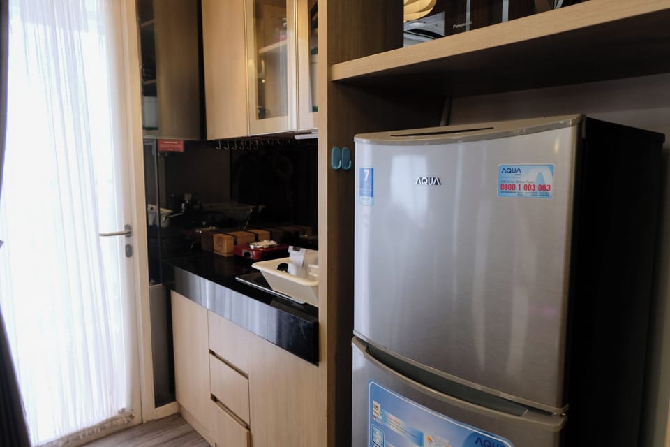 Deluxe Apartment | Private kitchen | Full-size fridge, microwave, stovetop, rice cooker
