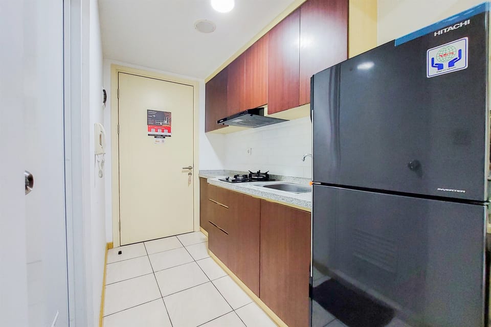 Deluxe Apartment | Private kitchen | Full-size fridge, stovetop, rice cooker, cookware/dishes/utensils