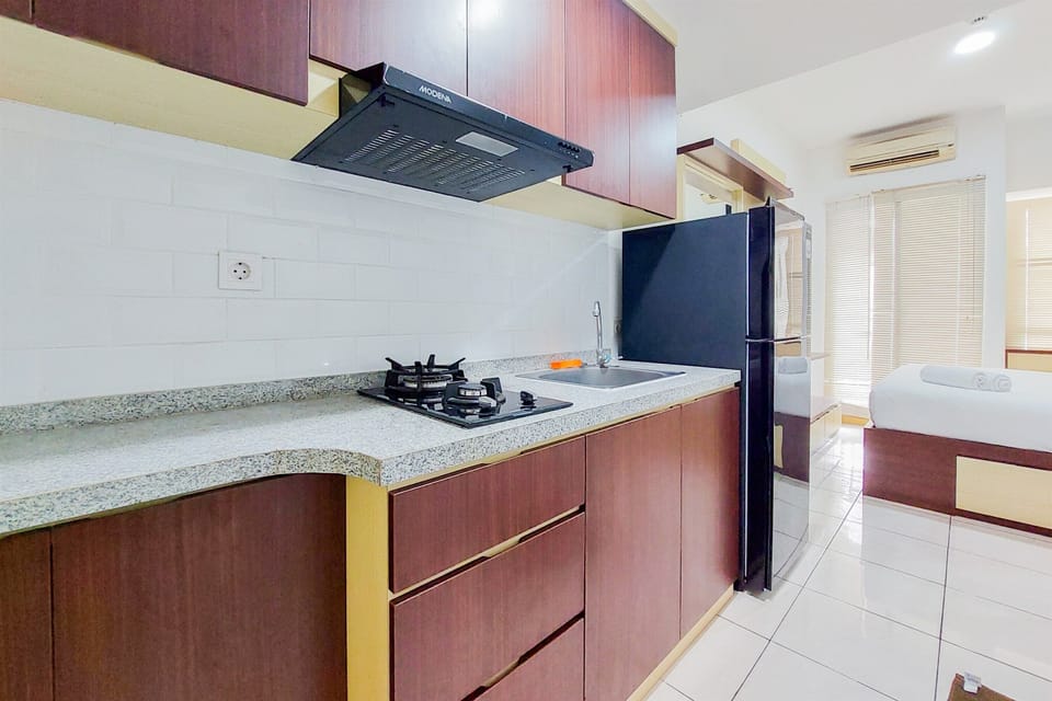 Deluxe Apartment | Private kitchen | Full-size fridge, stovetop, rice cooker, cookware/dishes/utensils