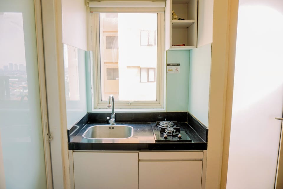 Deluxe Apartment | Private kitchen | Full-size fridge, stovetop, rice cooker, cookware/dishes/utensils