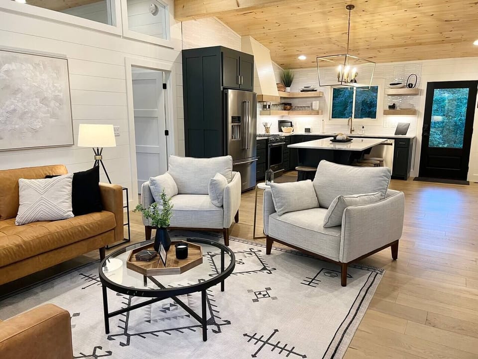 The kitchen is open concept and ready for a full house of gathering!  Whether a kitchen or a couch dweller, all are welcomed!