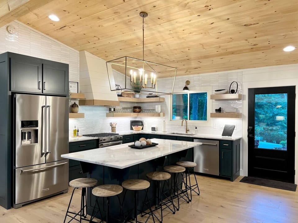 Enter the home to our fully equipped kitchen with eat in bar and high end appliances!  Bar seats 6 for a nice casual dining experience.  
