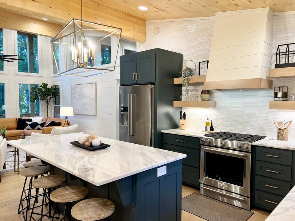 Full sized fridge, gas range and microwave drawer is among the amazing amenities offered in this fully equipped kitchen.