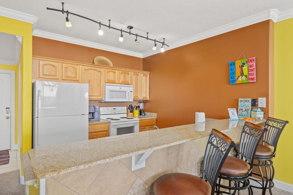 Condo, Multiple Beds, Balcony, Ocean View | Private kitchen | Fridge, microwave, oven, stovetop