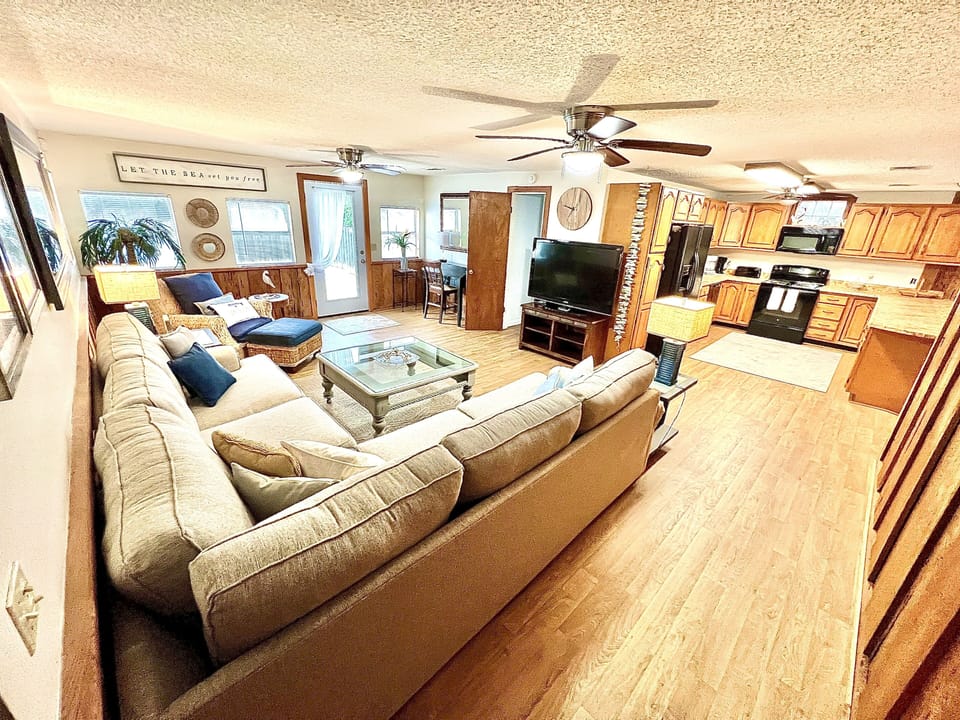 Open space, with kitchen + living room, great for family fun and entertainment.
