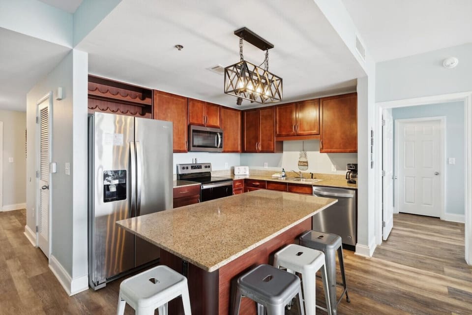 Fully Stocked Kitchen with Stainless Steel Appliances, Ocean Views and Island Bar Seating