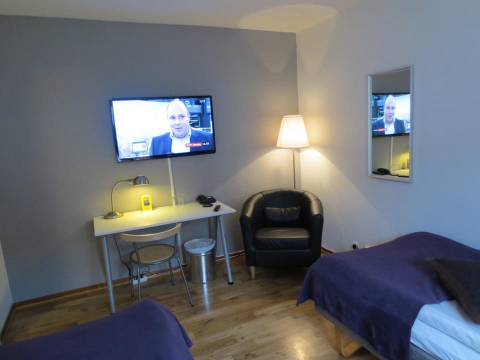 Desk, free WiFi, bed sheets
