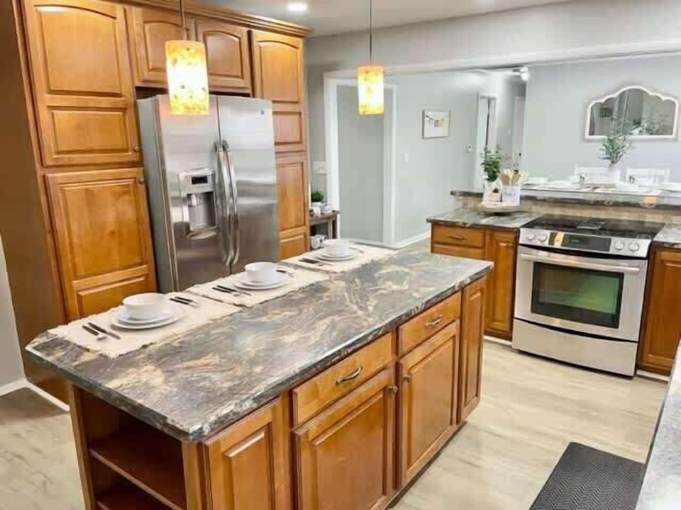 Kitchen | Central Breakfast Bar Perfect for Morning Coffee and Laid-Back Dining