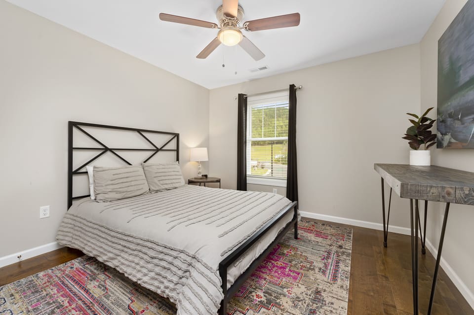Bedroom 3 at Sweetgum features a queen bed.