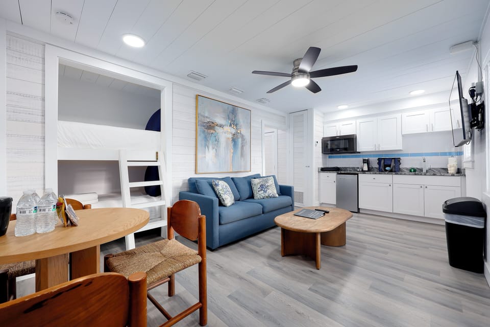 Siesta Bunkhouse - 1 Bedroom | Living area | 50-inch TV with cable channels