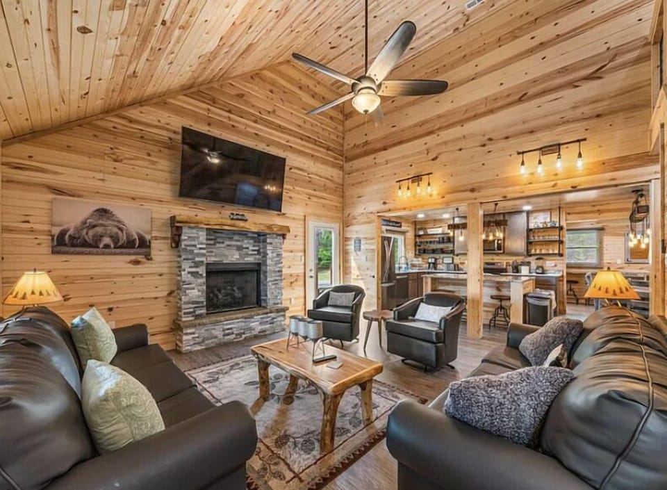 Cozy open living room with fireplace, perfect for gathering together