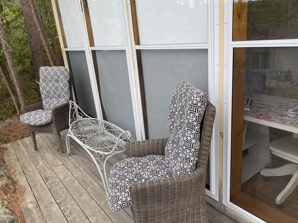 Deck in Front of Bunkhouse; enjoy morning coffee and the view as well