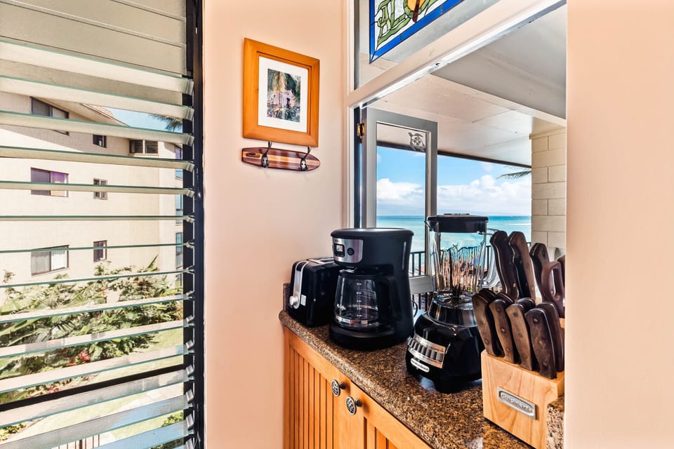 Drip coffee maker, blender, toaster, and necessary cutlery