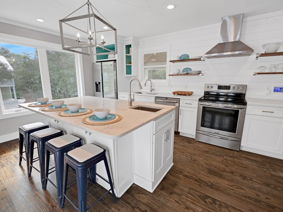 Updated Kitchen with Bar Stools for Four