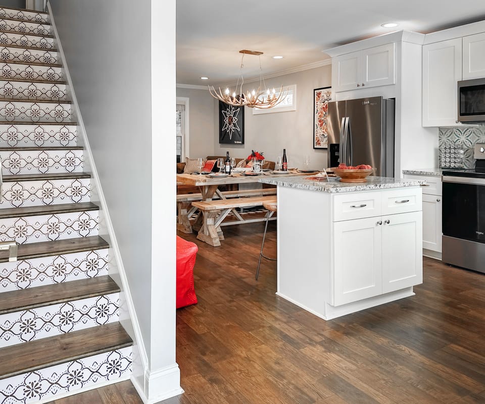 The main floor's open plan starts with a sunny kitchen!