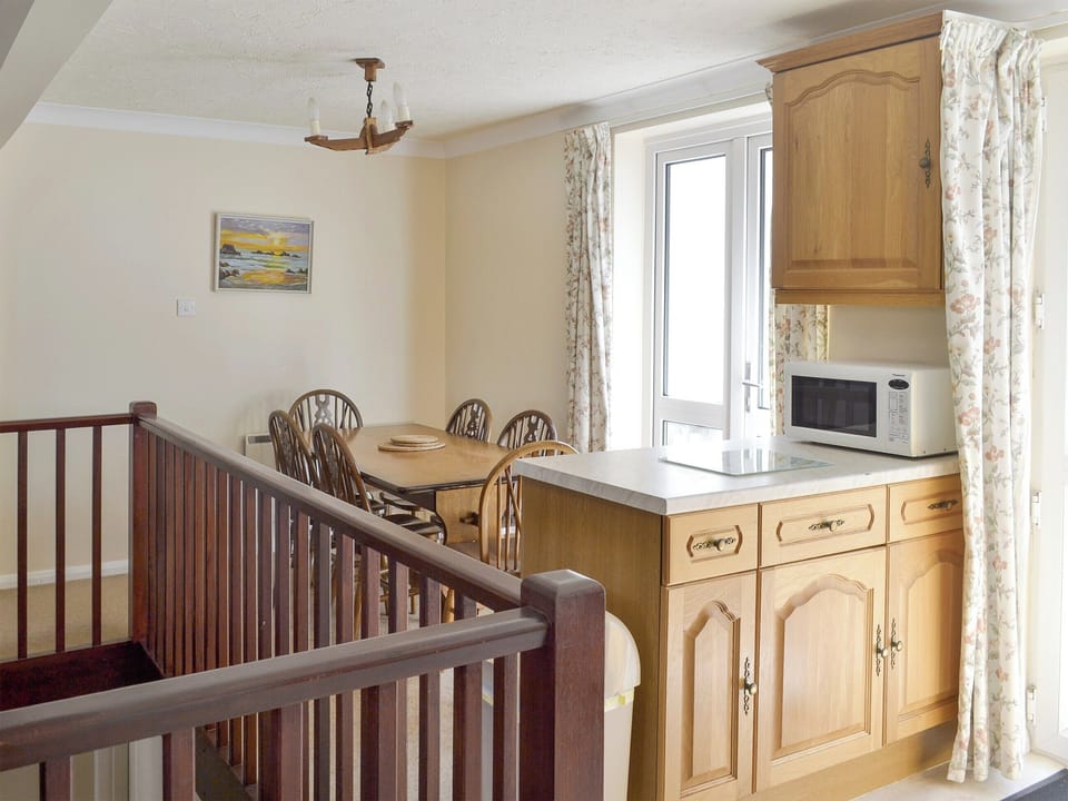 Open-plan living area includes dining and kitchen spaces | Smugglers Haunt - Anchor Cottages, Hope Cove, near Kingsbridge