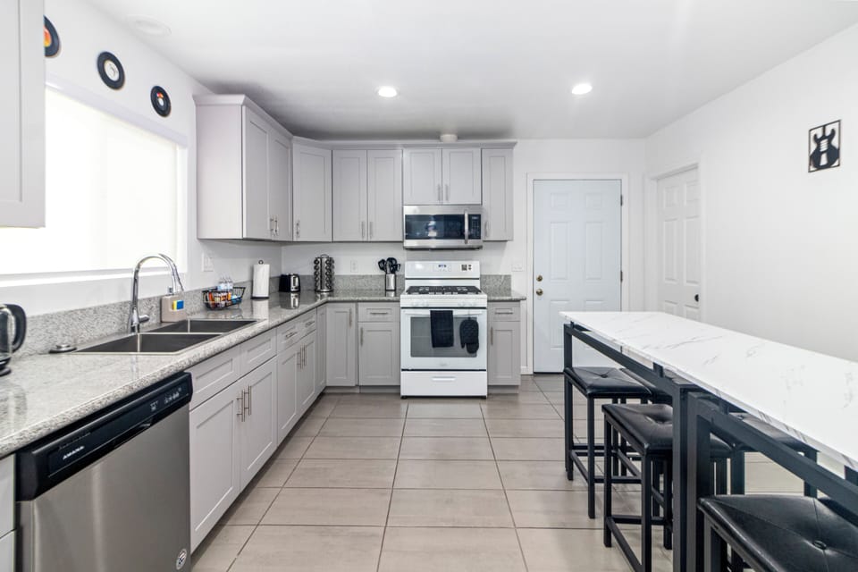 Cook up culinary delights in our equipped kitchen 