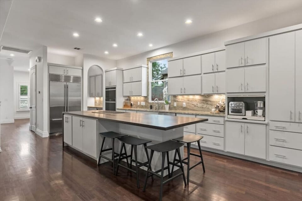 Chef`s dream Kitchen with commercial appliances and views of downtown.