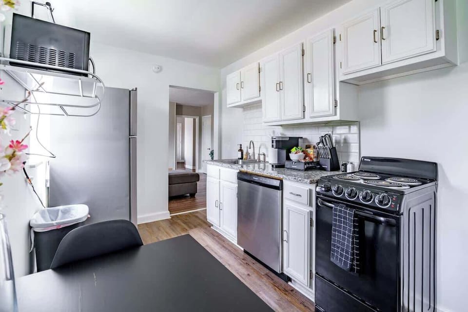 Home cooked meals are the best ‍ A fully equipped kitchen featuring a stylish bar and stools in our Airbnb rental 
High-traffic locations Columbus Ohio
