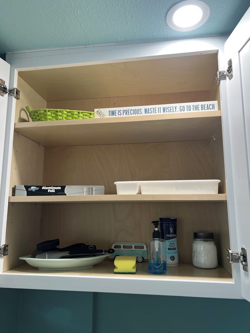 Kitchen stocked with storage containers and cooking essentials.