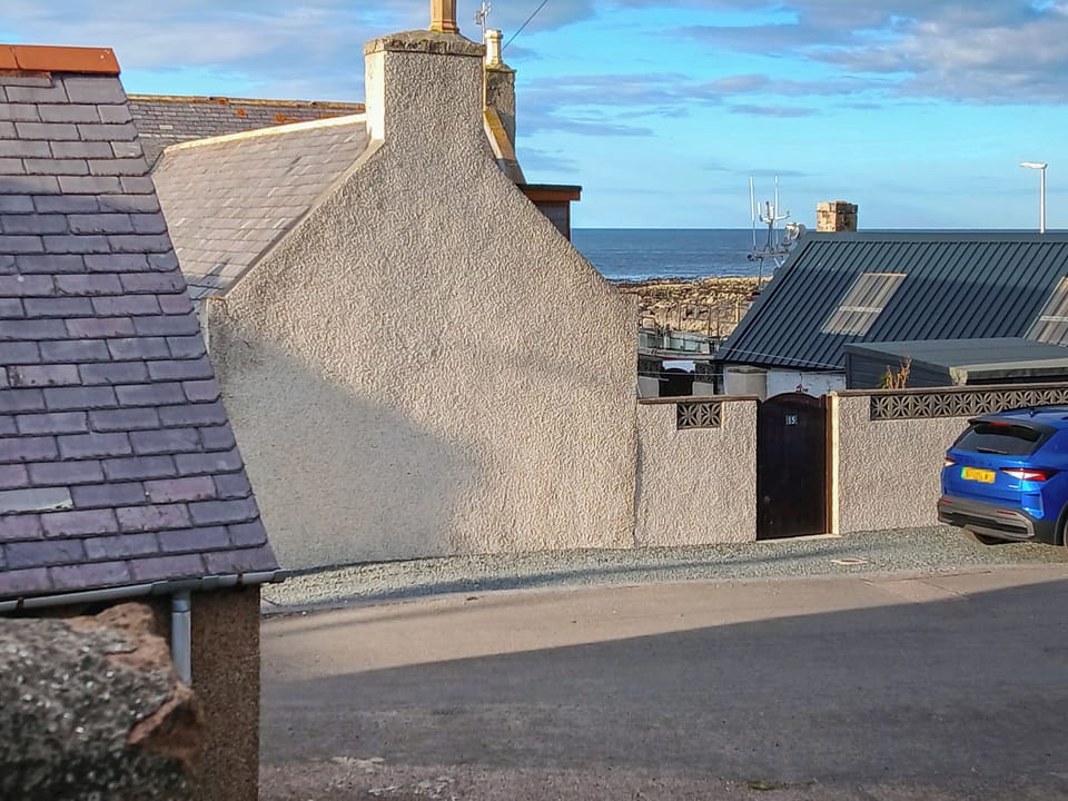 From upstairs window of the distance to the sea | Puffin Cottage, Fraserburgh
