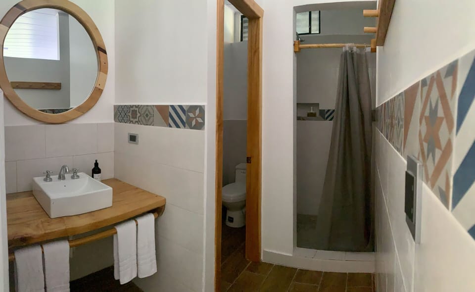 Deluxe Quadruple Room | Down comforters, WiFi (free), bed sheets