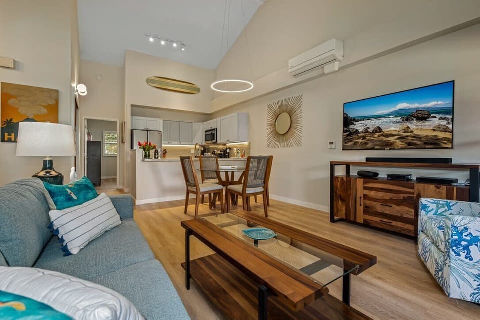 Luxury Condo | Living area | 80-inch Smart TV with cable channels