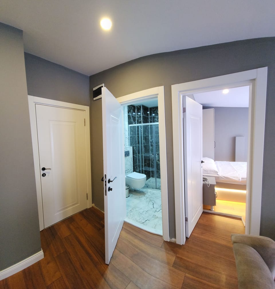 Family Suite, 1 Bedroom, City View | Frette Italian sheets, premium bedding, down comforters