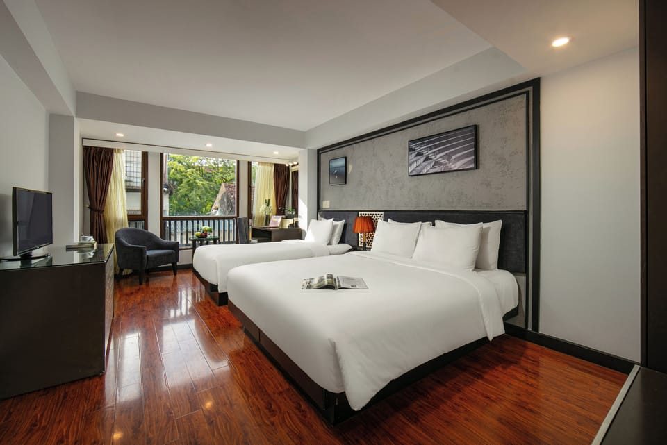 Family Quadruple Room, City View | Premium bedding, pillowtop beds, minibar, in-room safe