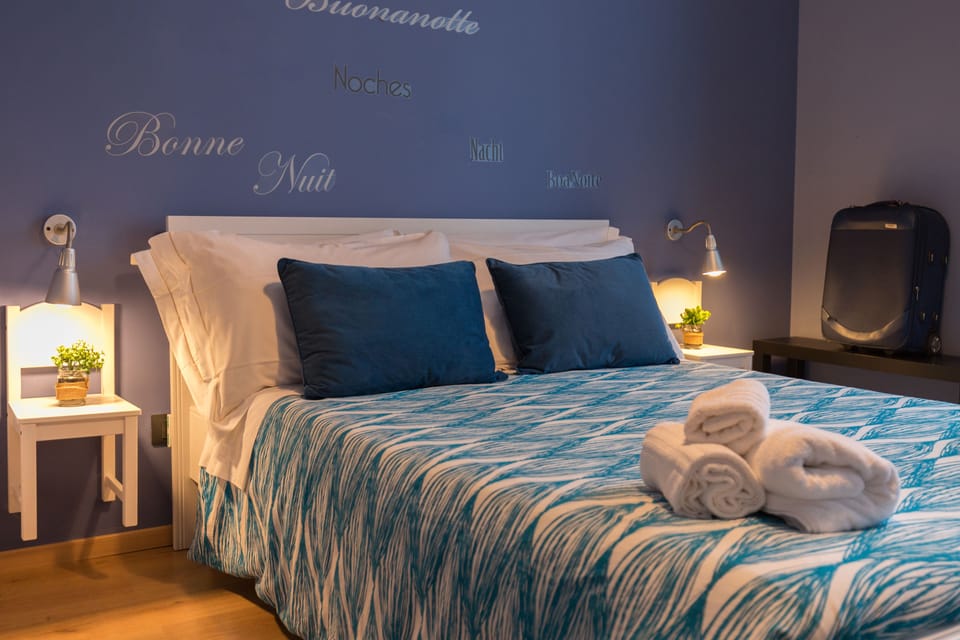 Quadruple Room, Private Bathroom (External) | Desk, iron/ironing board, free WiFi, bed sheets