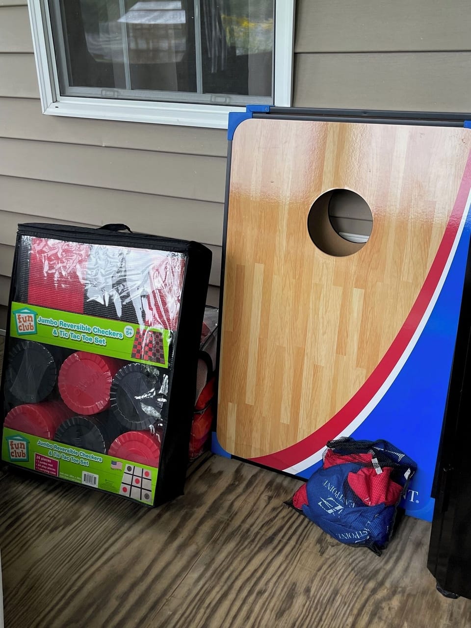 Jumbo checkers set and cornhole board games great for family fun!
