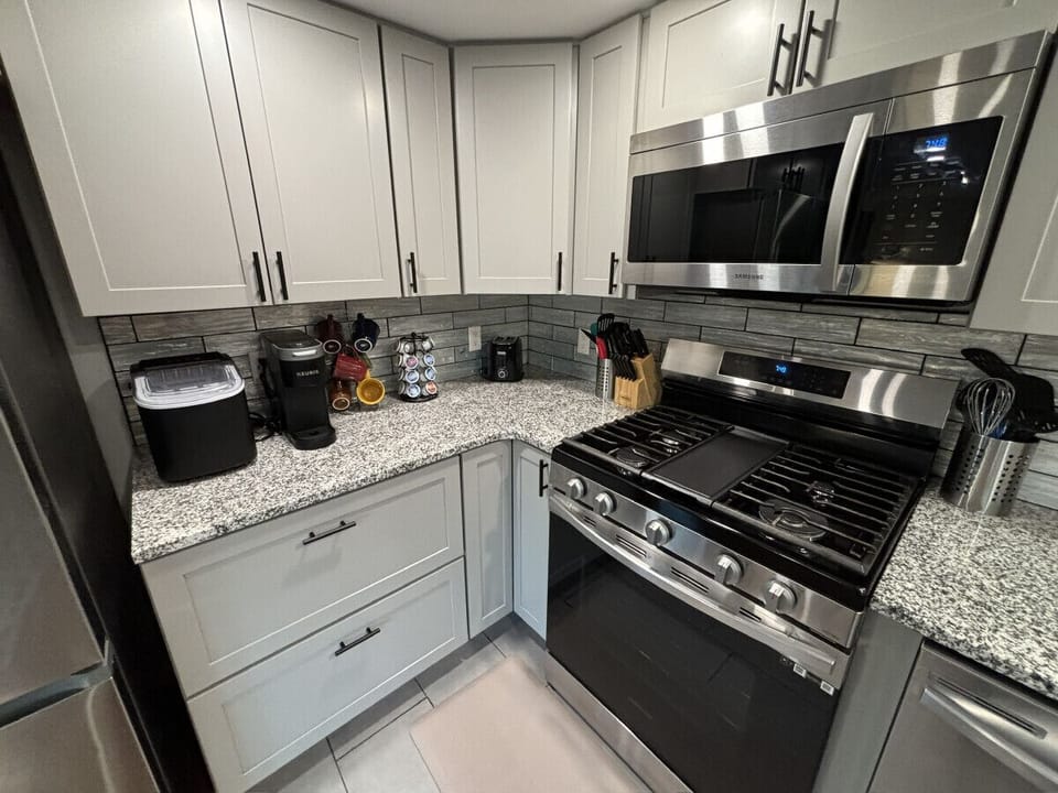 Keurig + K cups, creamer, sugar, ice maker, gas stove, many kitchen essentials!