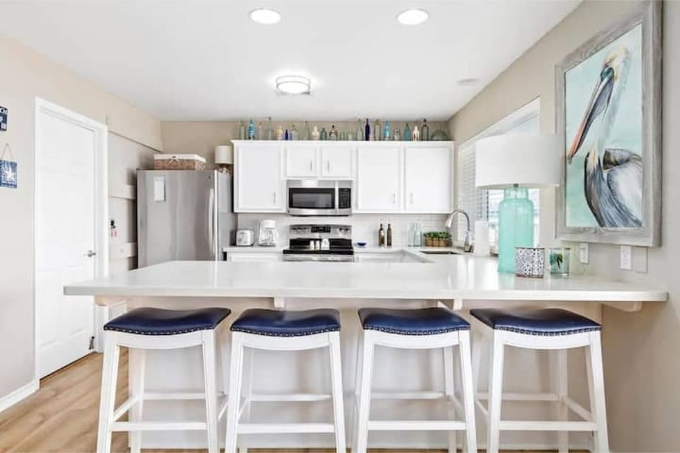 The open concept kitchen keeps everyone together.