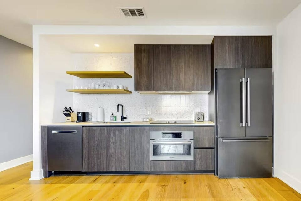 Luxury Condo, 1 King Bed with Sofa bed, City View | Private kitchen | Full-size fridge, microwave, stovetop, dishwasher