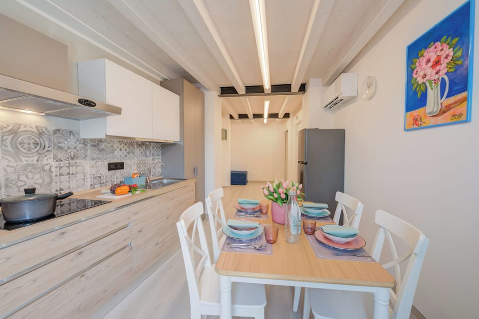 Standard Apartment, Multiple Bedrooms (Tulipano Apt - Palazzo Palermo 1817) | Private kitchen | Fridge, microwave, stovetop, dishwasher