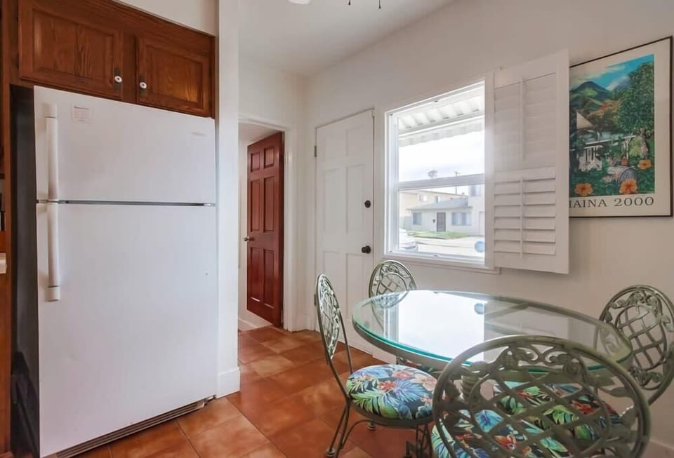 Kitchen leads to the main entrance and master bedroom