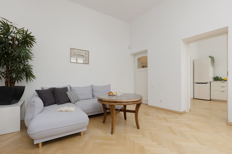 The living room's sleek design is both functional and aesthetically pleasing.